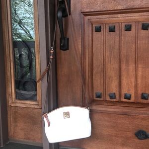 Dooney & Bourke white pebbled leather purse.